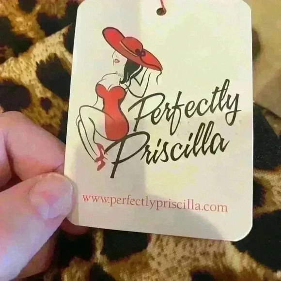 Perfectly Priscilla stretchy leopard flare pants. Size Large. New with tags! 🐆 - Picture 3 of 6